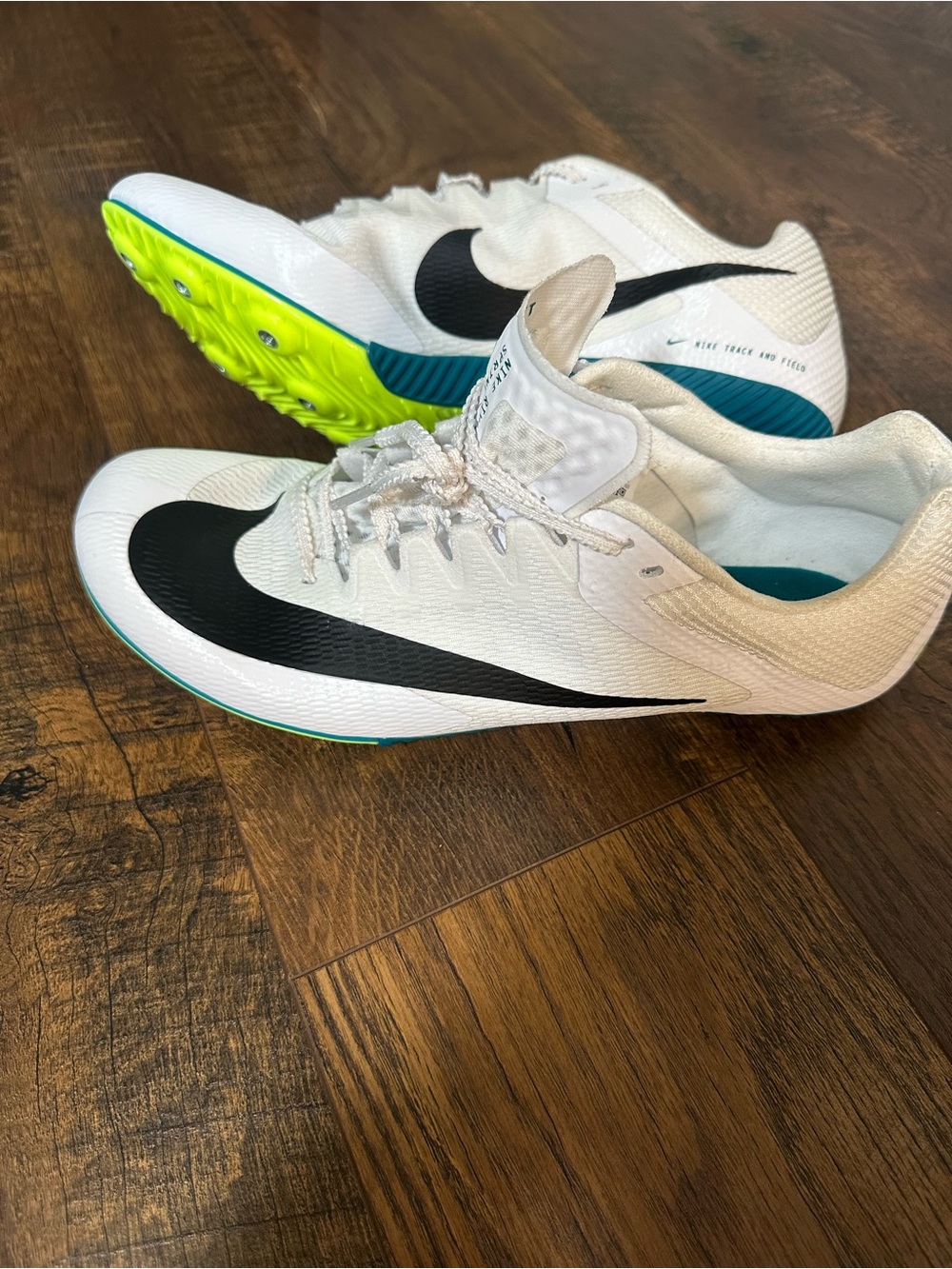 Nike Men’s White Track Spikes with Black Swoosh and Neon Yellow Sole